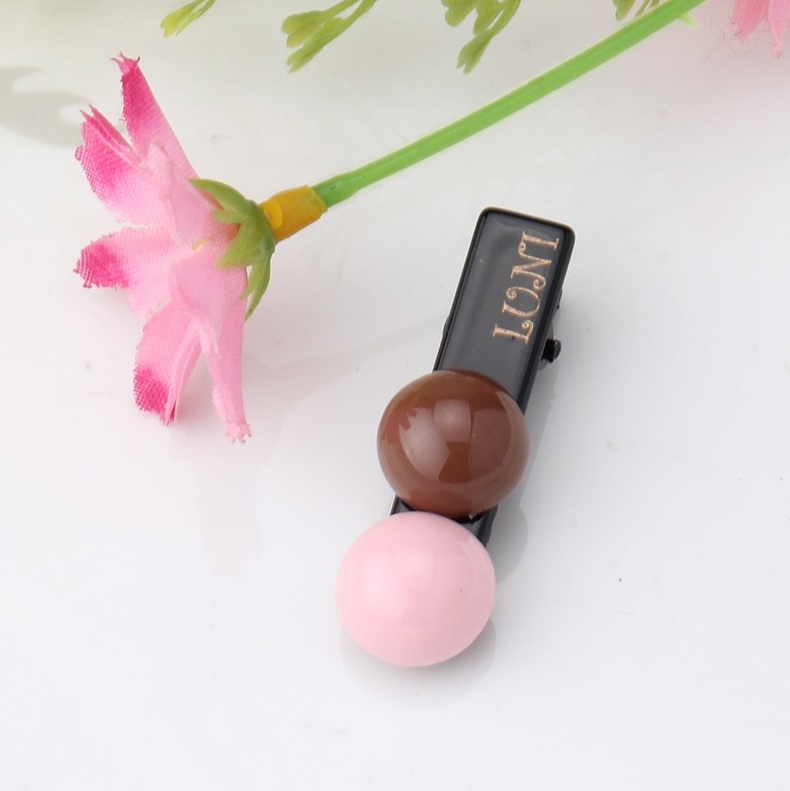 barrette bonbon rose et chocolat pour chien