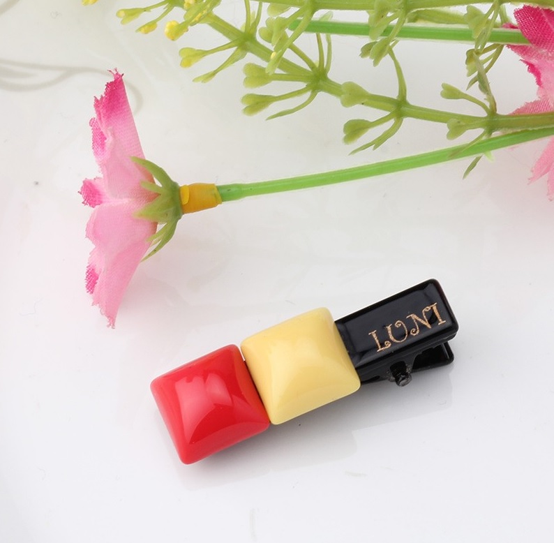 barrette bicolore rouge et jaune pour chien