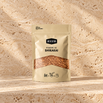 Pochette WAAM Shikakai sur travertin beige
