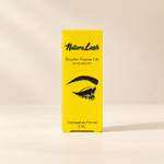 NaturaLash jaune sur fond crème