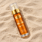 Flacon ambré WAAM sur sable beige