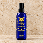 Eau florale citron sur travertin beige