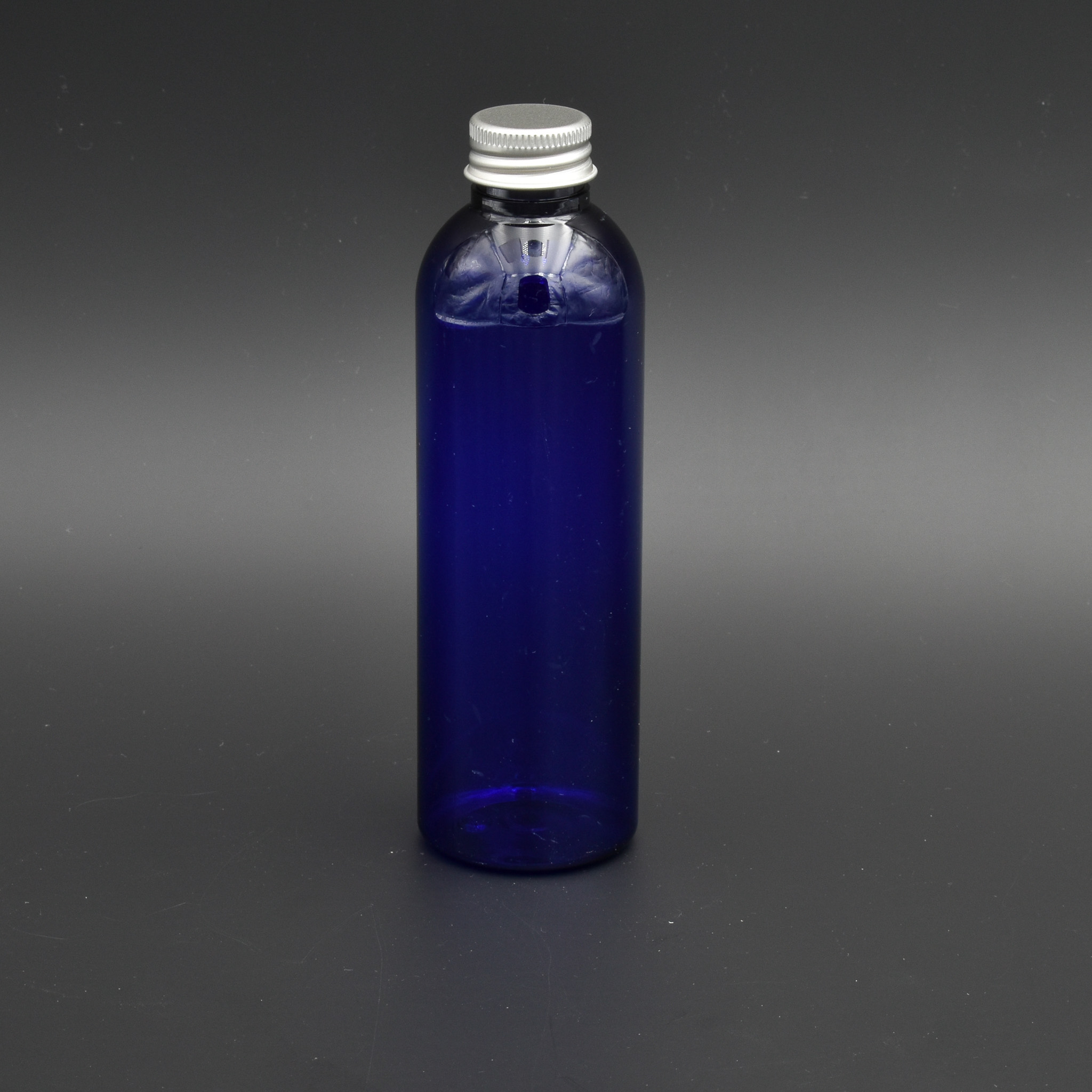 Flacon plastique 200 ml bleu anti UV et son bouchon alu