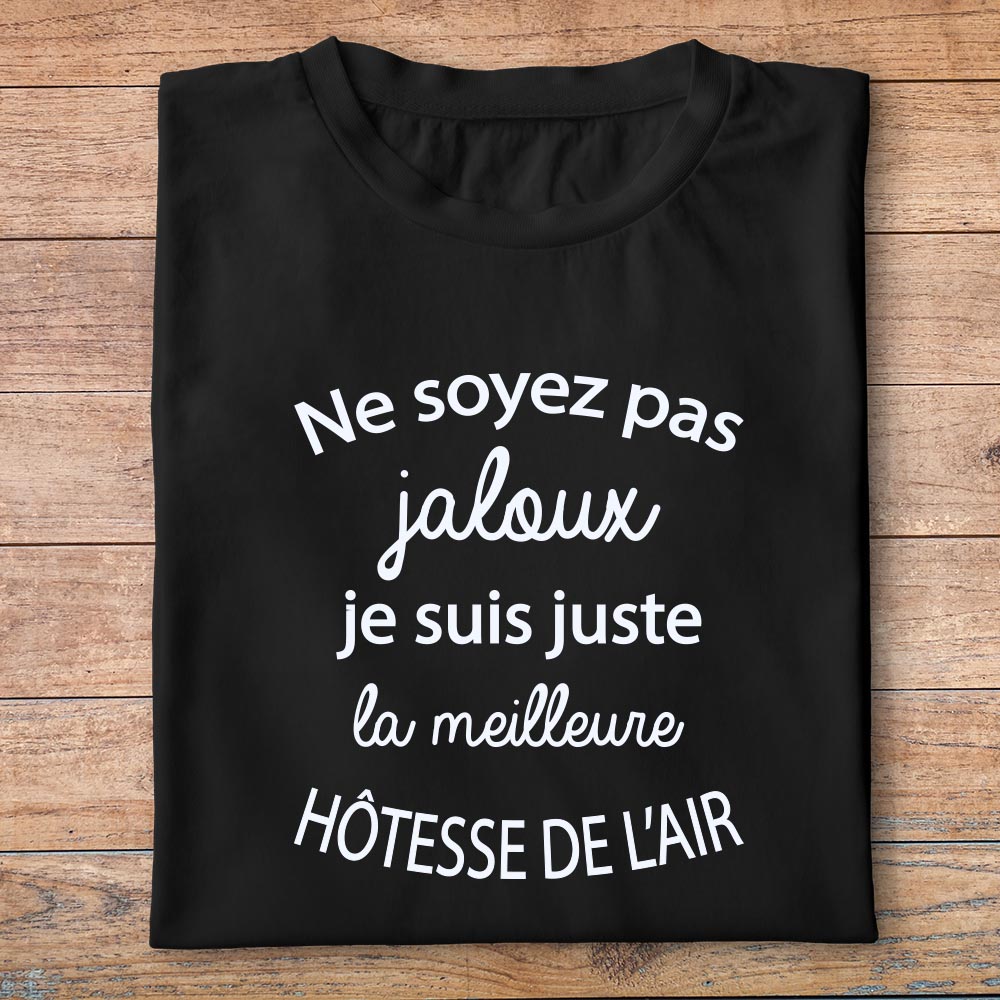 ftm25bis-métiers-ne-soyez-pas-jaloux-je-suis-juste-la-meilleure-Hôtesse-de-l-air-t shirt-plié-femme-couleur-noir