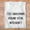flddc1- Le dîner de cons - C'est cruellement fatiguant d'être intelligent - t shirt plié homme - couleur blanc