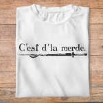 fk13- Kaamelott C'est d'la merde - t shirt plié homme - couleur blanc