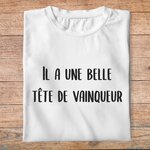 flddc3- Le dîner de cons -Il a une belle tête de vainqueur-  t shirt plié homme - couleur blanc