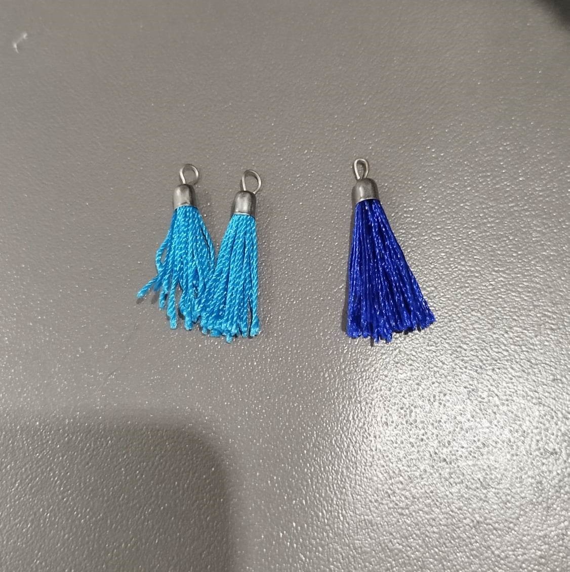 Pompoms frange bleus