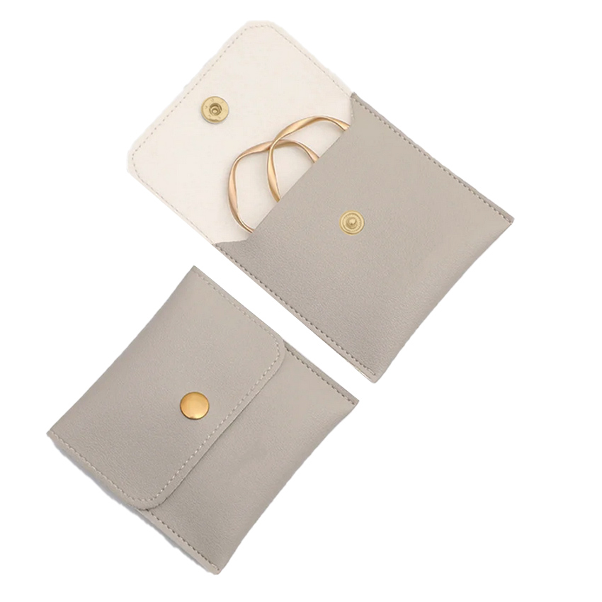pochette-rangement-bijoux-similicuir-gris-bijoux-olympe-bijoux-acier-inoxydable-bagues-colliers-bracelets-boucles-d-oreilles-creoles-joncs
