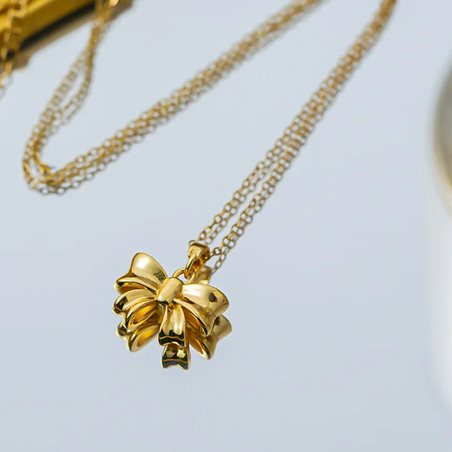 collier-noeud-bow-rosette-olympe-bijoux-acier-inoxydable-bagues-bracelets-colliers-boucles-d-oreilles-creoles-broches3