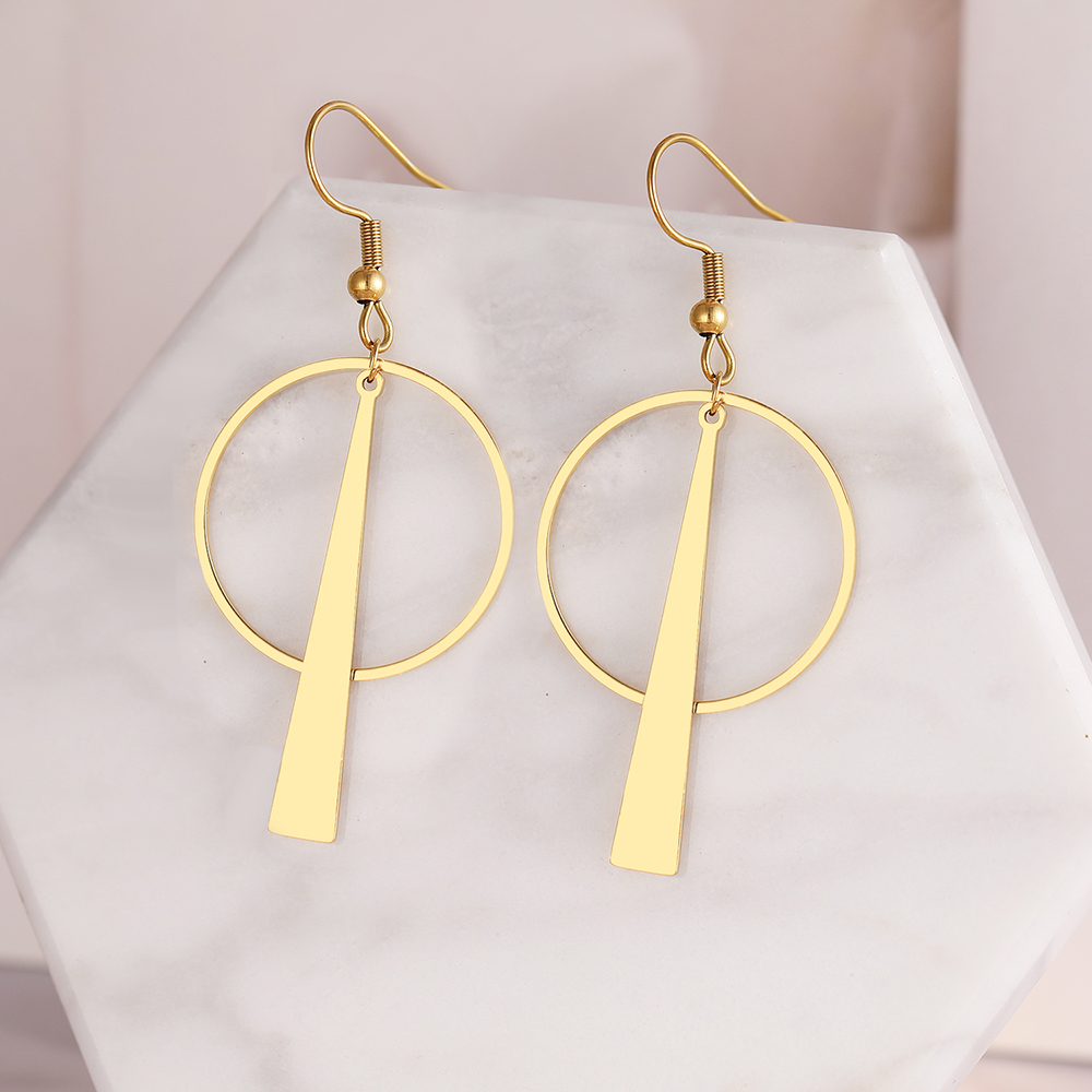 boucles-oreilles-batonnet-olympe-bijoux-fond-marbre