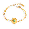 bracelet-chaine-trombone-medaillon-dore-turquoise-olympe-bijoux-fond-blanc
