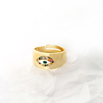 bague-epaisse-oeil-zircon-multicolore-olympe-bijoux-fond-blanc-froisse