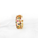 bague-queen-zircon-multicolor-dore-olympe-bijoux-fond-blanc-froisse-zoom