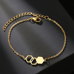 collier-minimaliste-pentagone-dore-olympe-bijoux-fond-noir