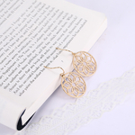boucles-oreilles-mandala-fleuri-olympe-bijoux-pose