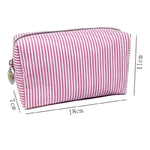 Trousse-a-rayures-rose-Olympe-bijoux-bagues-colliers-joncs-bracelets-boucles-d-oreilles-creoles3