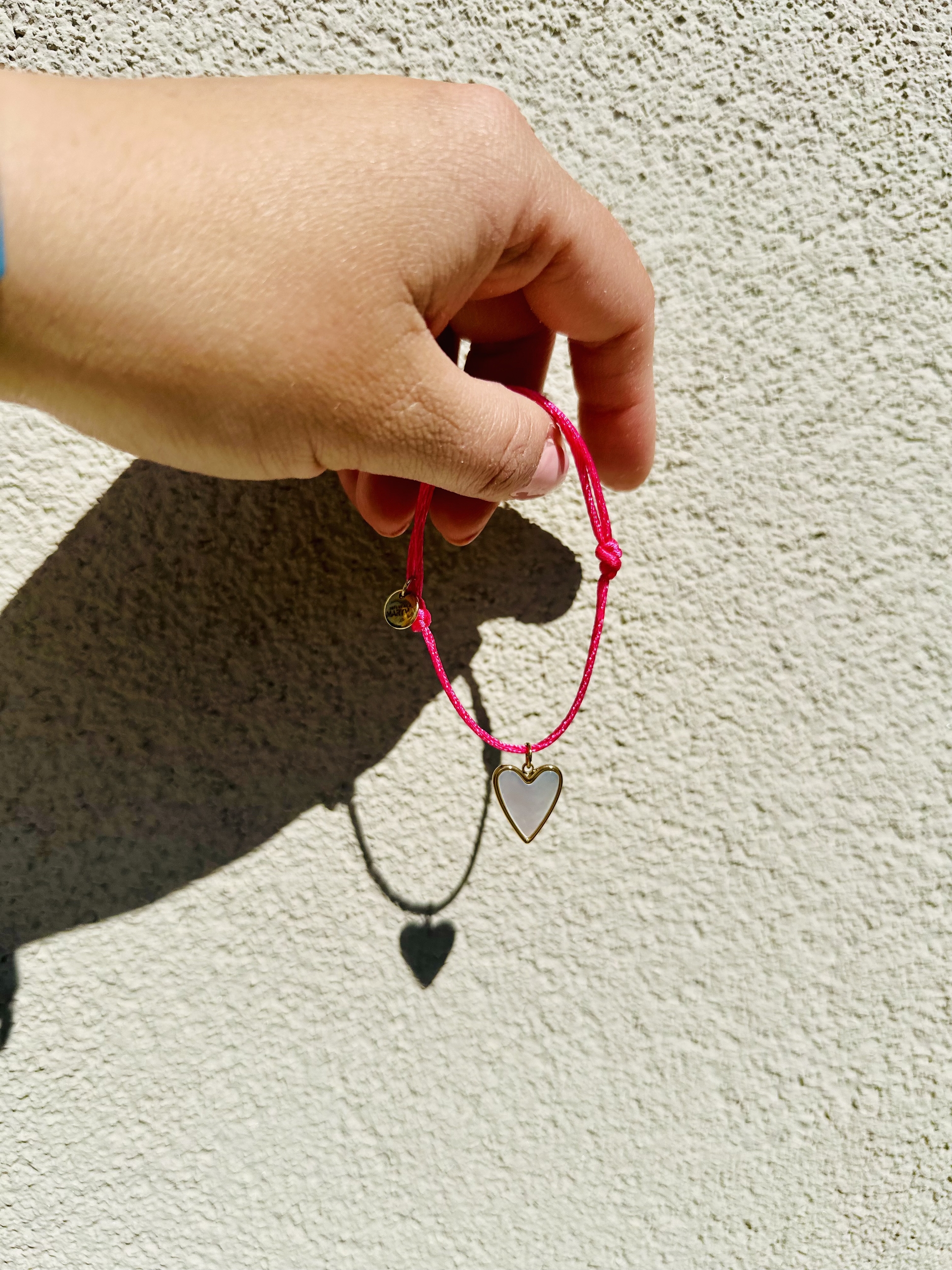 Bracelet ficelle avec breloque coeur pour enfant