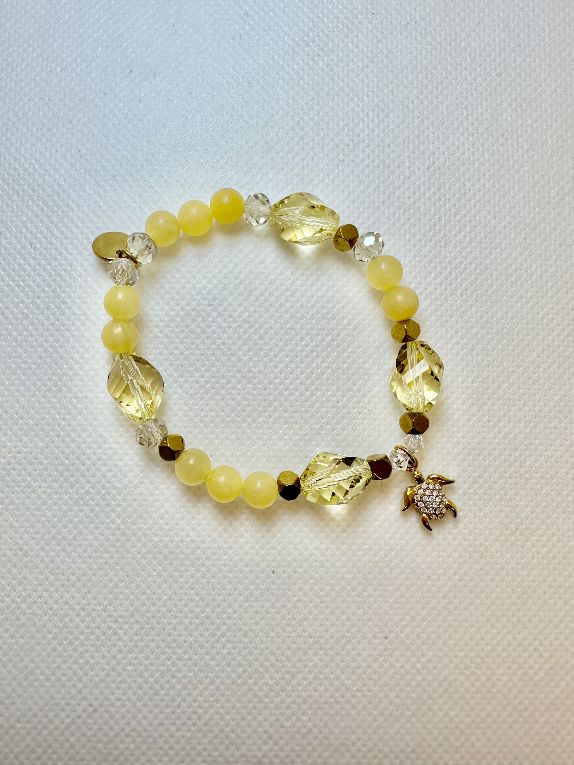 Breloque tortue doré à strass