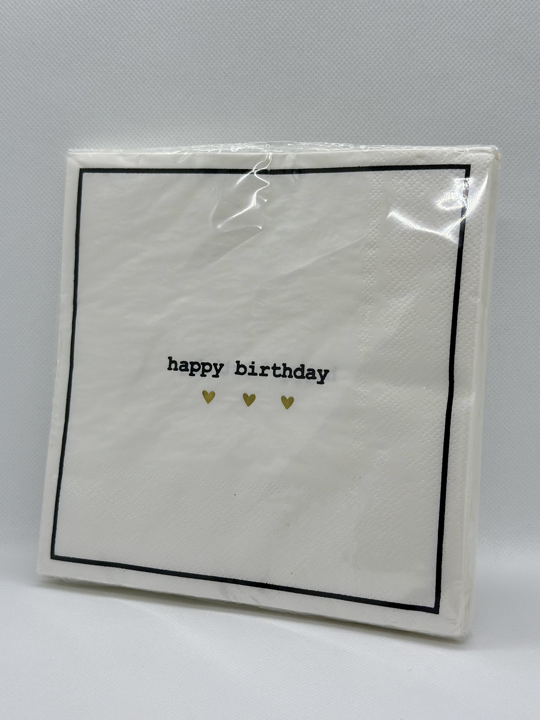 Serviette de table en papier blanche et doré. Pour un anniversaire. Serviette de table pas cher.