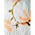 Collier avec breloques orange en perles