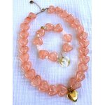 Collier avec des gros coeurs rose et doré