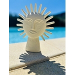 Décoration bohème chic statue en forme de soleil