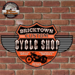 plaque vintage cycle shop en relief