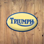 plaque émaillée logo triumph rétro