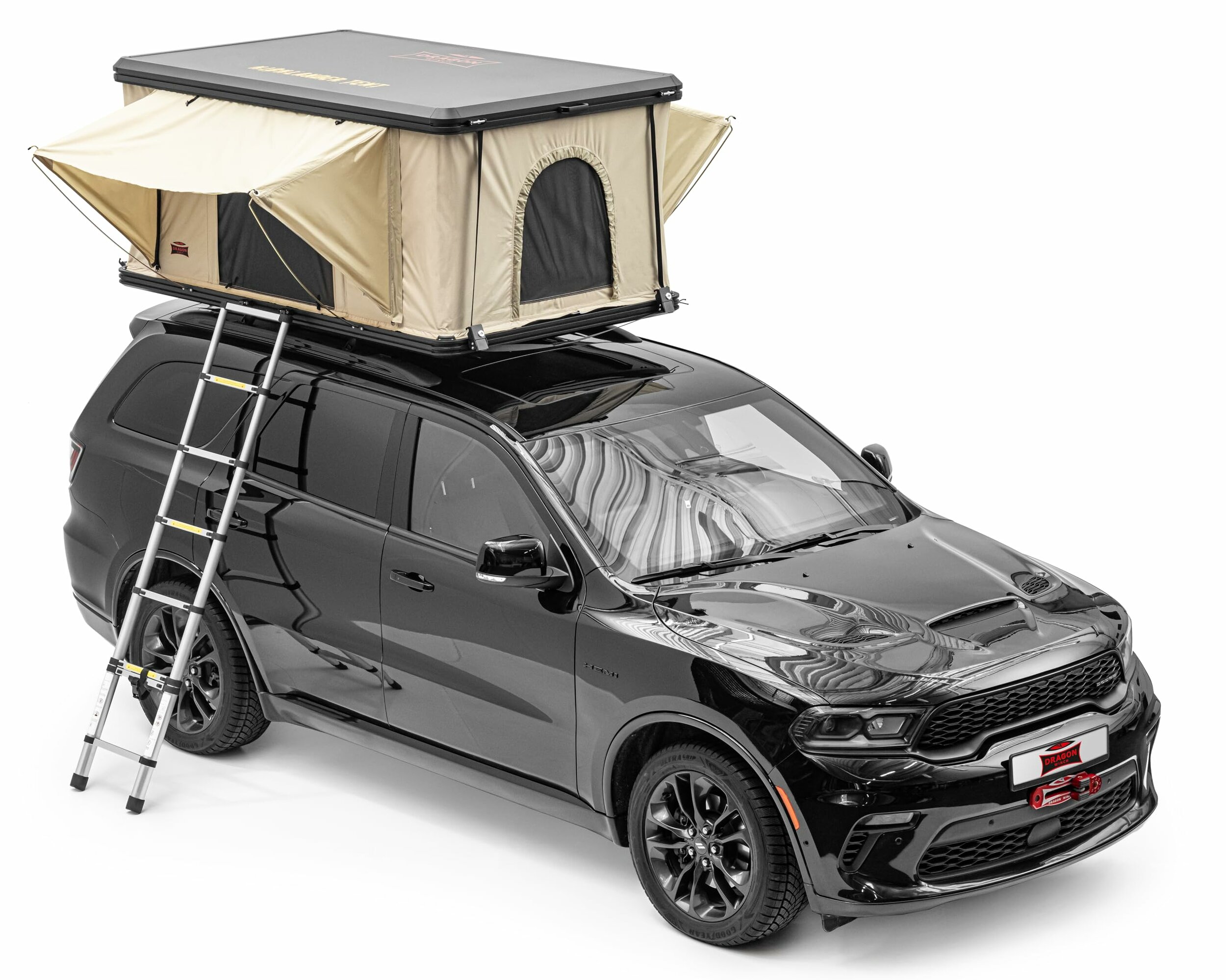 Tente de toit rigide Dragon Winch Type R ouverte sur un SUV noir, échelle dépliée