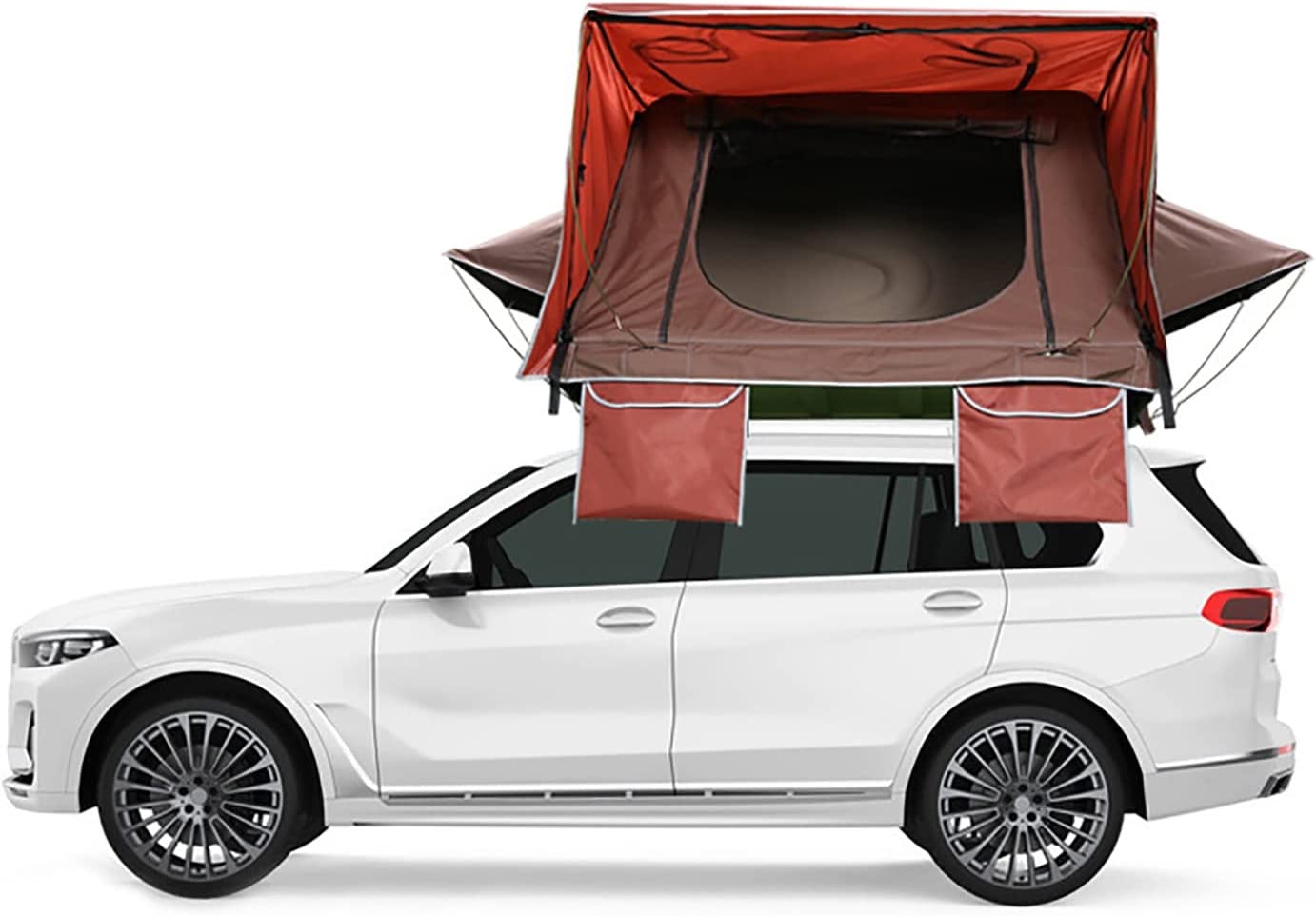 Tente de toit à coque dure, toile rouge, ouverte sur un SUV blanc vu de profil