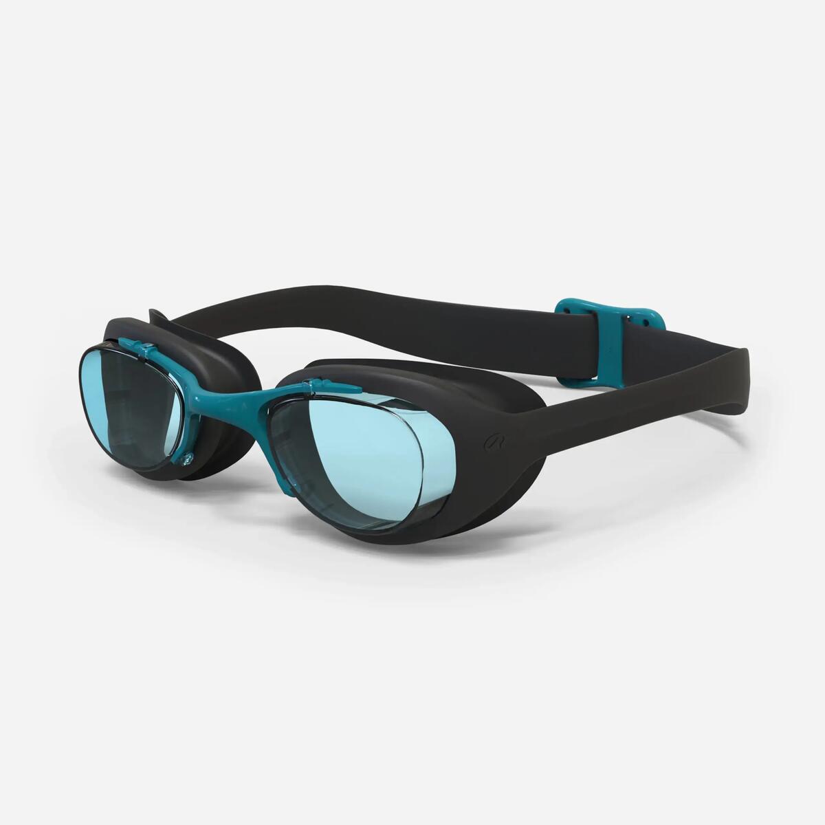 Lunettes de natation Xbase noir et bleu, verres clairs, vue de trois quarts