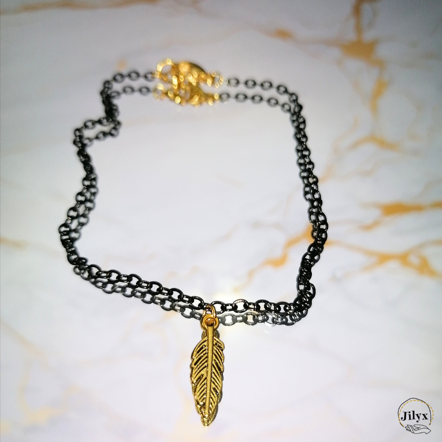 Bracelet pendentif plume noir et doré marbre