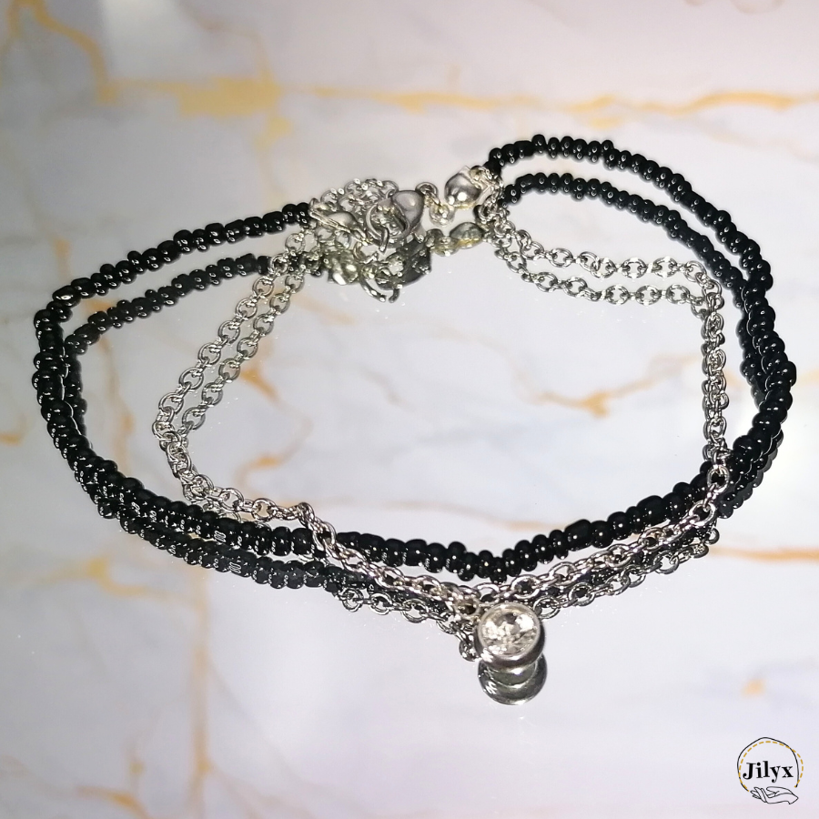 Bracelet bi matière noir et argenté strass blanc marbre