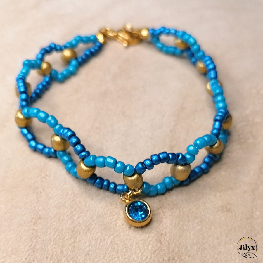 Bracelet bleu croisé avec pendentif strass bois