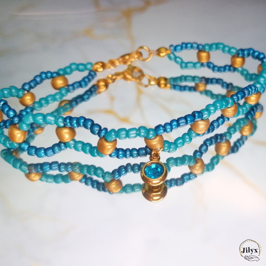 Bracelet bleu croisé avec pendentif strass marbre