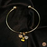 Bracelet jonc doré abeille jaune satin