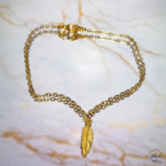 Bracelet pendentif plume doré marbre