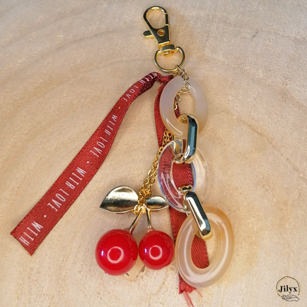 Porte-clés Porte-bonheur En Sac Cerise - Sac à Cote DIvoire