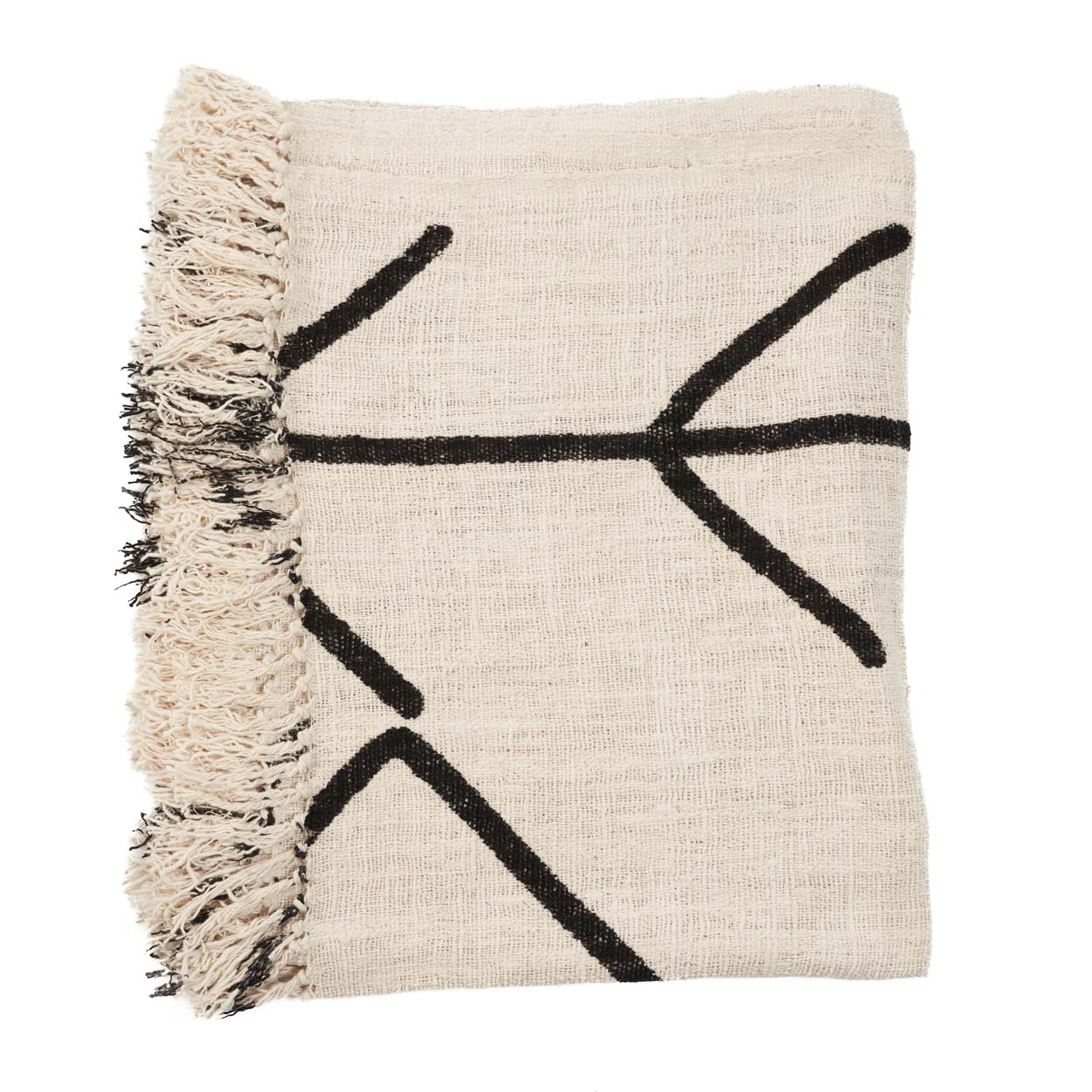 Couverture beige pliée avec dessins noirs et bord macramé fabriqué en Indonésie
