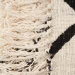Tissu beige et noir et macramé réalisé en Indonésie
