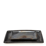 2 plats burned terre cuite noirs