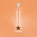 Bouteille transparente verre étoile de mer