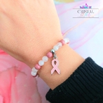 octobre-rose-bougie-bracelet-pierres-naturelles-rhodonite-quartz-morganite-quartz-rose-lithotherapie-cristal-color-le-pouvoir-des-cristaux-lutte-contre-le-cancer