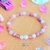 bracelet enfant pierres naturelles quartz fraise quartz rose rhodonite cristal de roche amour confiance en soi stress rentree scolaire calin cristal color