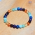 bracelet-7-chakra-pierres-naturelles-harmonie-grenat-cornaline-citrine-aventurine-verte-aigue-marine-lapis-lazuli-amethyste-cristal-color