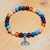 bracelet-7-chakra-pierres-naturelles-lotus-grenat-cornaline-calcite-rhodonite-turquoise-sodalite-amethyste-cristal-color