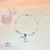 bracelet-pierres-naturelles-quartz-rose-selenite-nacre-cristal-de-roche-perles-coeur-serenite-amour-beaute-cristal-color-by-aline-le-pouvoir-des-cristaux