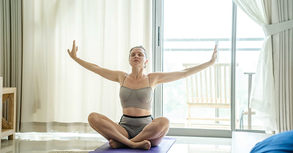 woman practicing yoga with closed eyes