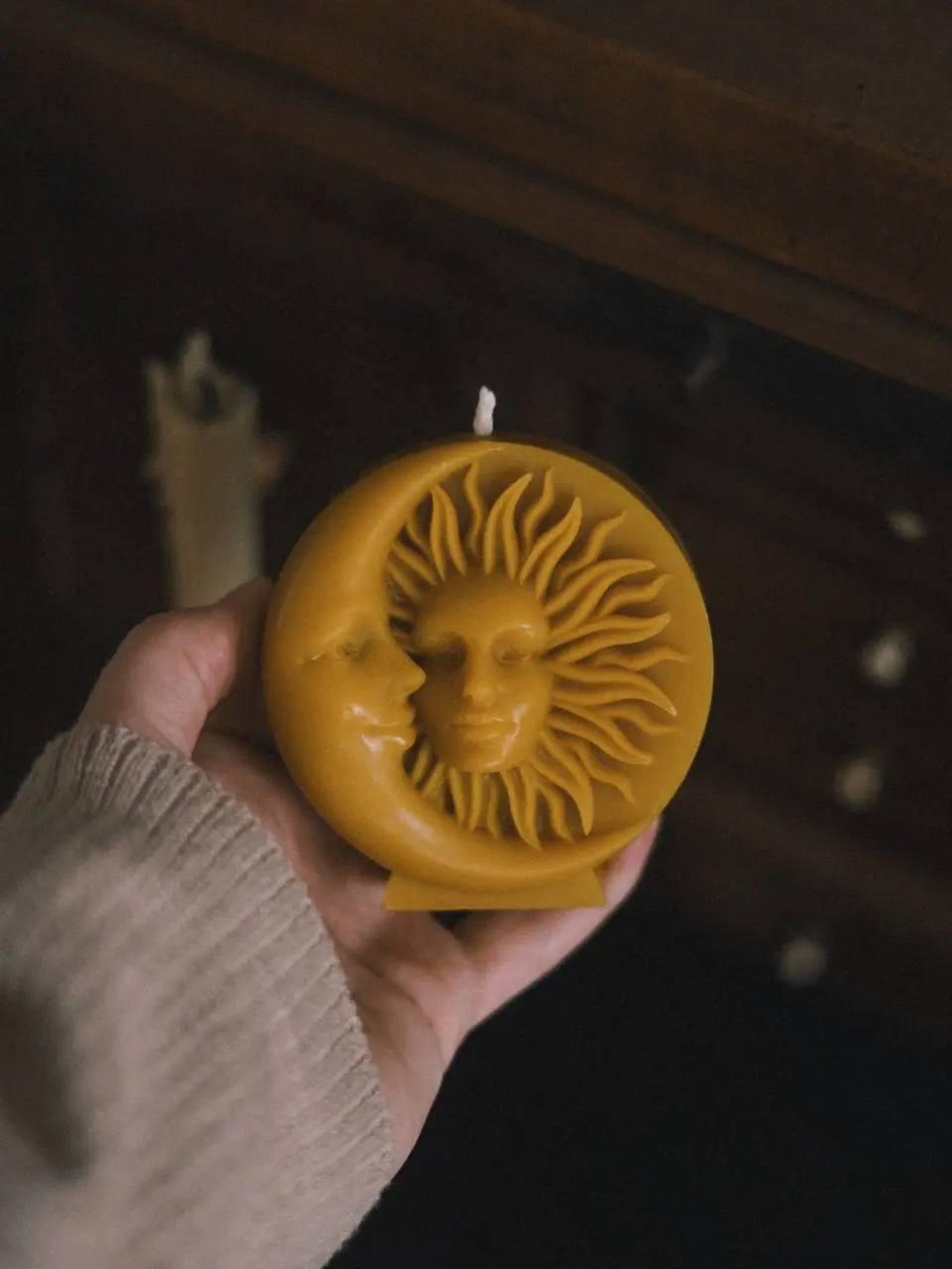 Close-up full-width image of the candle showing texture and layered wax